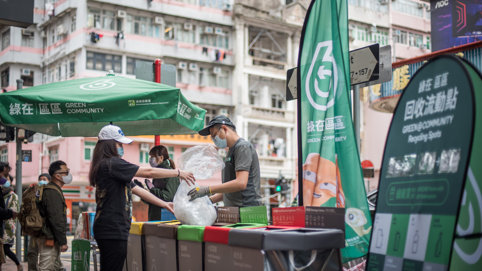 Members of public in difference age groups are practicing waste separation and recycling